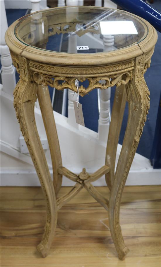 A pair of beech glass top torchere stands, H.93cm